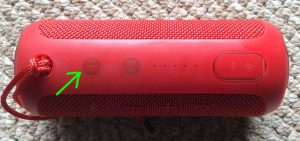 Picture of the Bluetooth speaker, top view, showing -Power- button highlighted. Speaker is OFF.