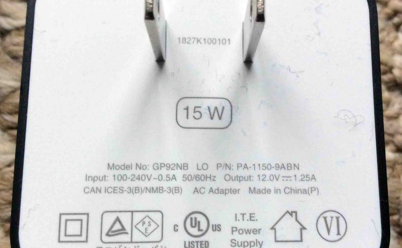 Picture of the Amazon power adapter, model # GP92NB, for the Generation 3 Alexa Echo Dot speaker, showing its plug and specs label side.