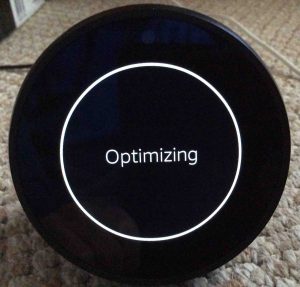 Picture of the Amazon Echo Spot speaker, finishing up optimization after factory reset.