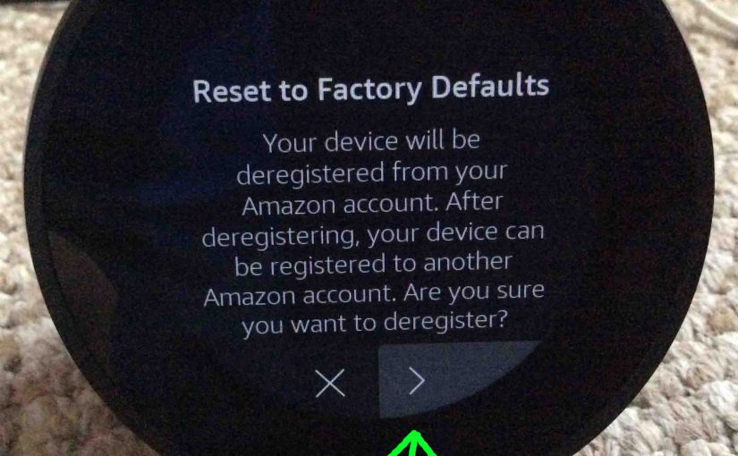 Picture of the Amazon Echo Spot talking speaker, displaying its Reset To Factory Defaults screen, with the Yes-Continue button highlighted.