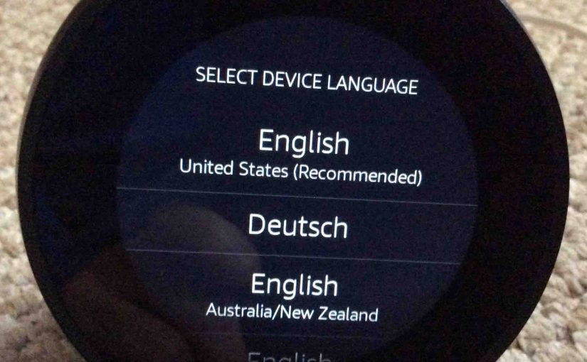Picture of the Amazon Echo Spot Alexa speaker, displaying its Select Device Language screen.