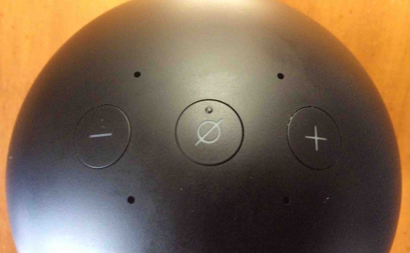 Picture of the Amazon Echo Spot video speaker, top view, showing all its buttons.