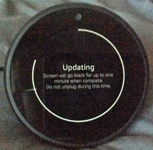 Picture of the speaker. firmware updating, at 85 percent done. Echo Spot Firmware Update.