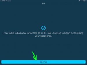 Screenshot of the Alexa app on iOS, displaying its -Echo Sub Connected To WiFi Successfully- page, with the -Continue- bar highlighted.