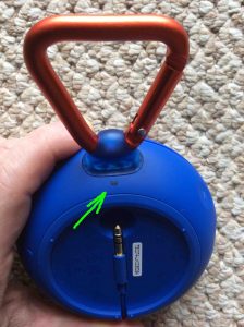 Picture of the Bluetooth speaker, top back view, powered OFF, showing the dark status lamp highlighted.