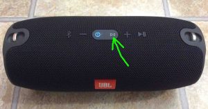 Picture of the JBL Extreme speaker top panel view, showing the connect button highlighted.