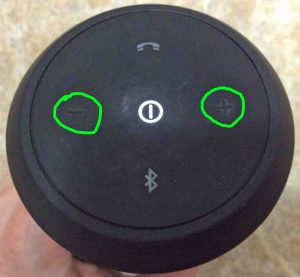 Picture of the JBL Flip 2 Bluetooth speaker with its volume controls circled.