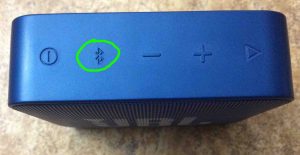 Picture of the top of the speaker, showing its Bluetooth Pairing button circled.
