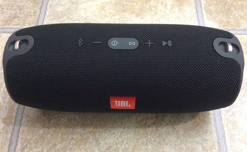 Picture of the JBL Xtreme Bluetooth speaker, top front view, showing buttons and cloth grill.