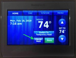 Screenshot of the Honeywell RTH9580WF smart thermostat, displaying its -Hold Options- page, with the -Cancel Hold- button highlighted.