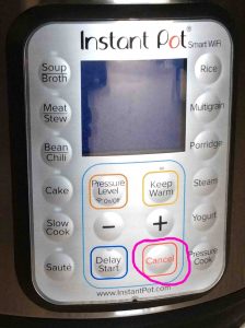Picture of the Instant Pot electric smart WiFi pressure cooker front view, showing the -Cancel- button circled.
