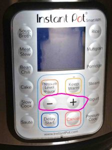 Picture of the -Down- and -Up- buttons circled. Instant Pot WiFi Buttons.