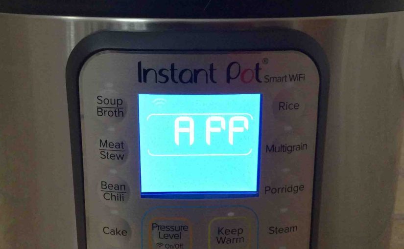 Picture of the The Instant Smart WiFi Pot, front view, showing what the LCD screen looks like when the cooker is in APP mode, and ready for WiFi setup.