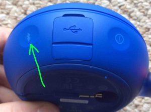 Picture of the speaker's -Bluetooth- button highlighted.