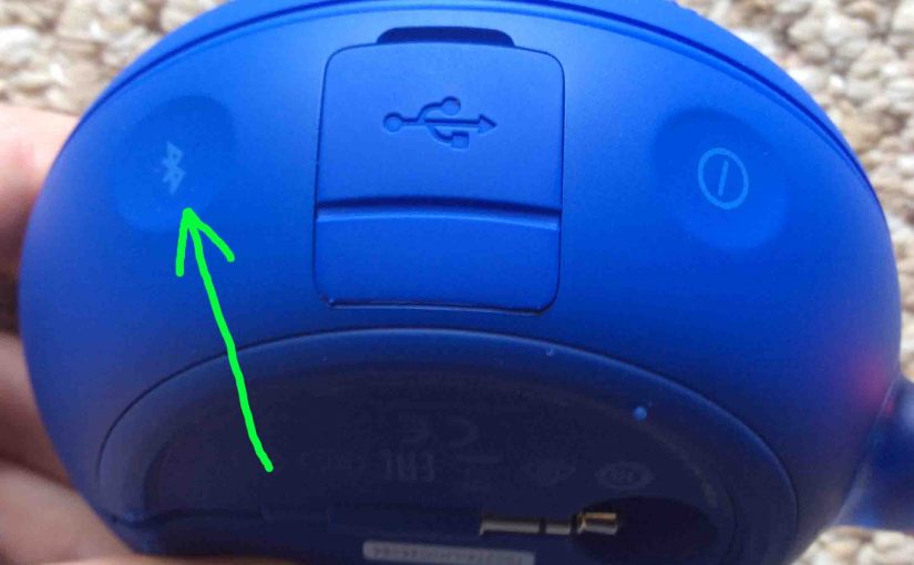 Picture of the JBL Clip 2 speaker, showing its -Bluetooth- button highlighted.