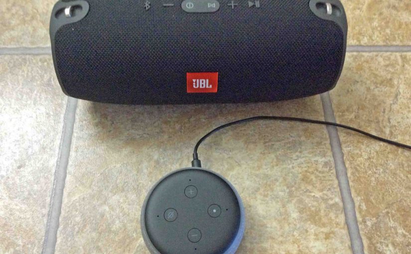 Picture of a JBL Xtreme speaker with an Alexa Echo Dot 3 smart speaker.