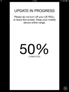 Screenshot of the UE app on iOS, displaying its -Update In Progress- page, showing that the firmware update is 50 percent complete.