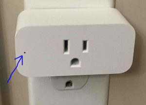 Picture of the Amazon Smart Plug, powered up, showing its dark pilot lamp highlighted.