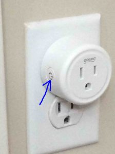 Picture of the Gosund mini smart outlet, left front view, with the status light in the Action button highlighted.