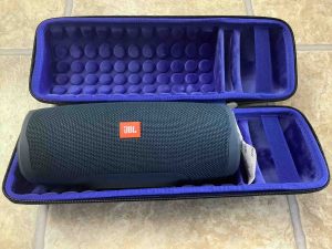 Picture of the JBL Charge 4 BT speaker in a typical zip up case.