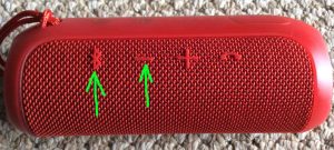Picture of the JBL Flip 3 speaker, showing the Bluetooth and Volume Down buttons highlighted.