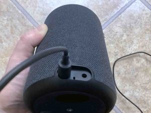Back view of the Echo 3rd Gen speaker, showing the AC power cord connected.