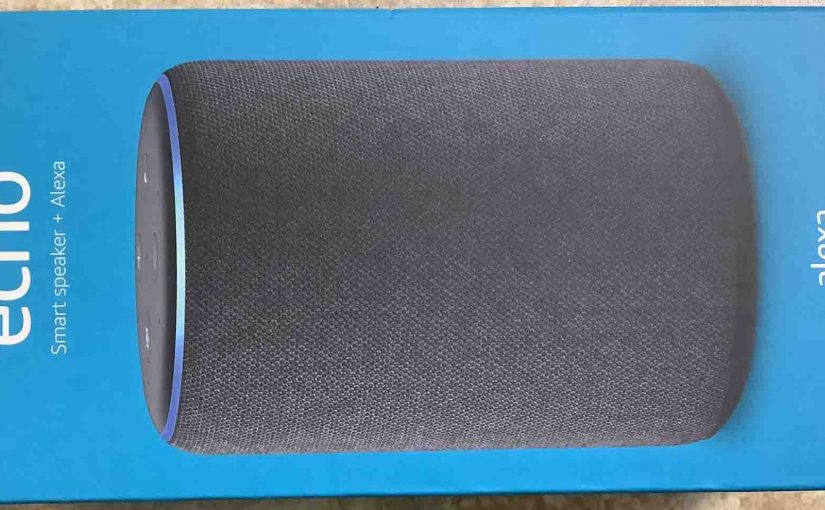 Picture of the Echo Generation 3 smart speaker original packaging front, shown sideways.