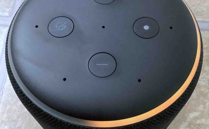 Top view of the Echo Alexa 3 smart speaker, showing the spinning orange light ring.