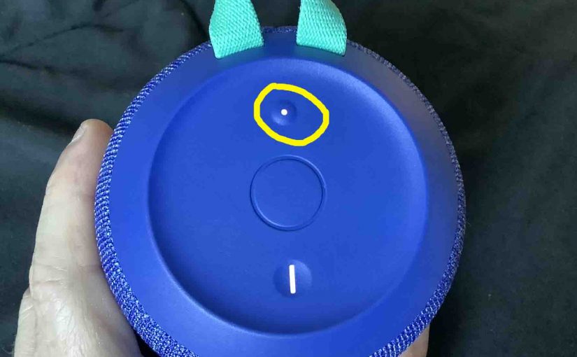 Top view of the Ultimate Ears Wonderboom 2 speaker with its Bluetooth pairing button circled.