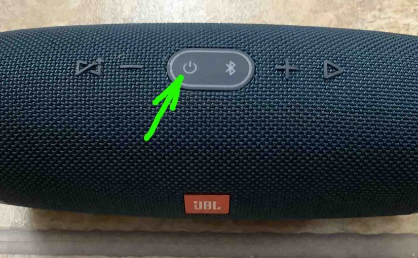 Picture of the JBL Charge 4 speaker, powered OFF, with its Power button highlighted.