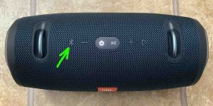 Top view of the JBL Charge 4 speaker, showing its -Bluetooth Pairing- button highlighted.