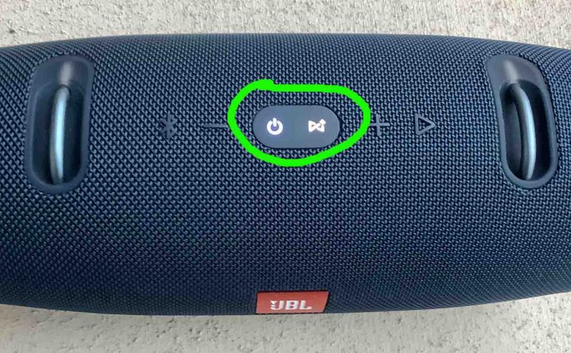Top view of the JBL Xtreme 2 waterproof speaker, showing the -Power- and -Connect- buttons glowing during reset, dircled.