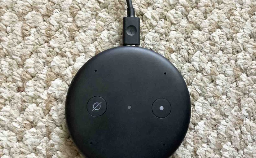 Top view of the Echo Input device, with the USB power cord connected.