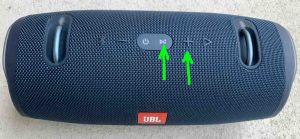 Top view picture of the speaker, showing the -Connect- and -Volume Up- buttons highlighted.