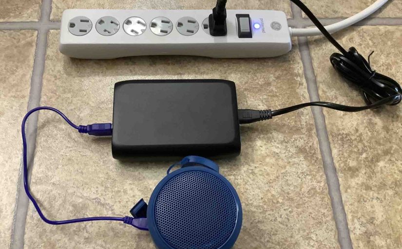 Sony SRS XB10 wireless speaker, charging from a Key Power HDD15-3-PD charger.