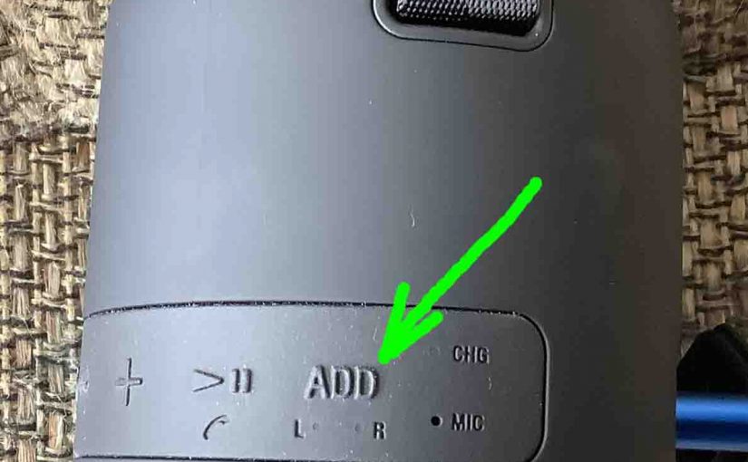 Picture of the -Add- button on the Sony SRS XB12 portable Bluetooth speaker.