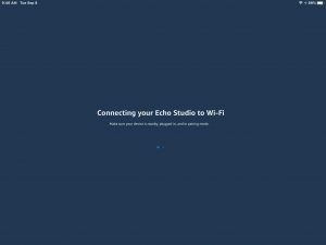 Screenshot of the app displaying its -Connecting your Echo Studio to WiFi- page. Alexa Echo Studio Setup.