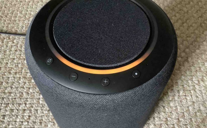 Picture of the Alexa Echo Studio speaker in Setup mode, displaying its orange light ring.