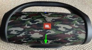 Front view of the JBL Boombox BT speaker, showing the battery level gauge, which is reading full charge in this picture.