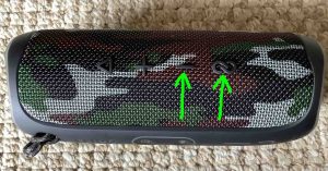 Showing the -Volume Down- and -PartyBoost- buttons on the speaker.