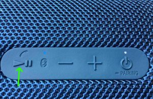 Picture of the Play-Pause button. Sony XB31 Buttons Explained.