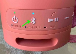 Picture of the -Bluetooth- button on the Sony SRS XB13 speaker.