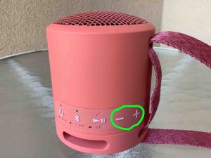 Picture of the Volume UP and DOWN buttons on the Sony SRS XB13 wireless speaker.