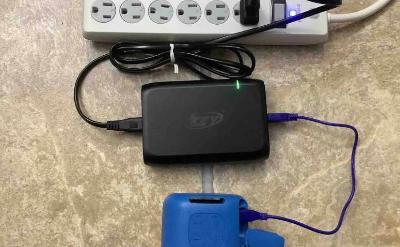 Picture of the Sony SRS XB01 speaker, connected and charging.
