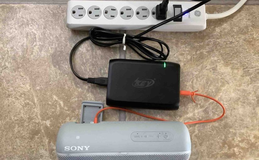 Picture of the Sony SRS XB22 speaker, connected and charging.