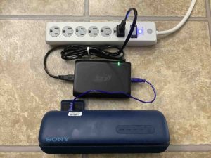 Picture of the Sony SRS XB32 speaker connected and charging.