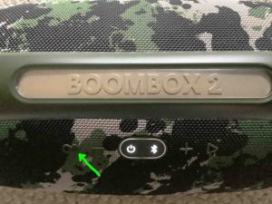 Picture of the infinity button (PartyBoost button) on the JBL Boombox 2 speaker.