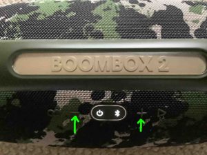 Picture of the Volume DOWN and UP buttons on the JBL Boombox 2 speaker. 