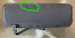 Picture of the Play-Pause and Volume Up buttons circled. JBL Flip 6 Hard Reset.