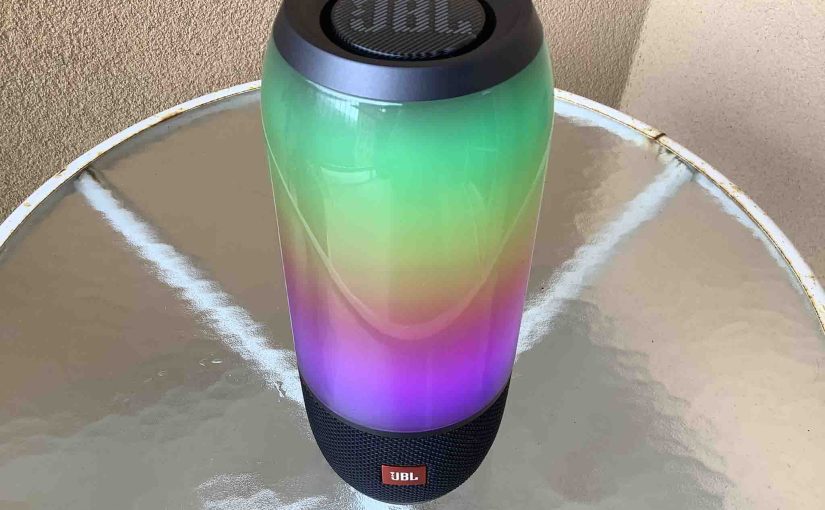 Picture of the top front of the JBL Pulse 3 speaker with rainbow color patterns displaying.